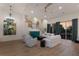 Bright living room with comfortable seating and high ceilings at 3015 Avenue E, Holmes Beach, FL 34217