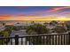 Stunning ocean view at sunset from a balcony at 3015 Avenue E, Holmes Beach, FL 34217