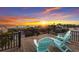 Enjoy ocean sunsets from this rooftop deck with comfy chairs at 3015 Avenue E, Holmes Beach, FL 34217