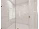 Spacious walk-in shower with marble tile and glass enclosure at 3015 Avenue E, Holmes Beach, FL 34217