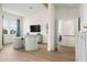 Relaxing sitting area with two armchairs and a view to the second floor at 3015 Avenue E, Holmes Beach, FL 34217