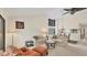 Spacious living room with vaulted ceilings, large windows, and comfortable seating at 3102 Windrush Bourne # 4, Sarasota, FL 34235