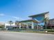 University Town Center mall entrance with modern architecture and palm trees at 3102 Windrush Bourne # 4, Sarasota, FL 34235