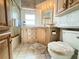 Clean bathroom with a shower/tub combo and wood cabinets at 3333 26Th E Ave # 1116, Bradenton, FL 34208