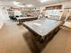 Community room with pool tables and a library at 3333 26Th E Ave # 1116, Bradenton, FL 34208