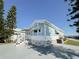 Light blue home exterior with white accents and landscaping at 3333 26Th E Ave # 1116, Bradenton, FL 34208