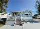 Cute light blue exterior with white trim and a deck at 3333 26Th E Ave # 1116, Bradenton, FL 34208