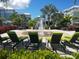 Water feature with lounge chairs in a community setting at 379 Aruba Cir # 301, Bradenton, FL 34209