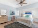 Bright bedroom with a comfortable bed and tasteful decor at 3860 Mariners Way # 413, Cortez, FL 34215