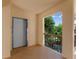 Hallway with elevator access and tranquil outdoor view at 3860 Mariners Way # 413, Cortez, FL 34215