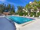 Inviting community pool with plenty of lounge chairs at 3860 Mariners Way # 413, Cortez, FL 34215