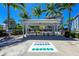 Community grill with picnic tables and game markings at 395 Aruba Cir # 302, Bradenton, FL 34209