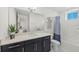 Bright bathroom with a bathtub, vanity, and neutral decor at 395 Aruba Cir # 302, Bradenton, FL 34209
