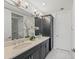 Double vanity bathroom with granite countertops at 395 Aruba Cir # 302, Bradenton, FL 34209