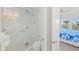 Bathroom with glass shower and toilet at 395 Aruba Cir # 302, Bradenton, FL 34209