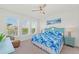 Bright bedroom with water views, featuring a king-size bed and water-themed decor at 395 Aruba Cir # 302, Bradenton, FL 34209