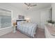 Charming bedroom with a king-size bed and coastal-themed decor at 395 Aruba Cir # 302, Bradenton, FL 34209