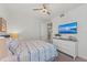 Serene bedroom with a king-size bed and built-in dresser at 395 Aruba Cir # 302, Bradenton, FL 34209