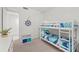 bedroom with a bunk bed and nautical decor at 395 Aruba Cir # 302, Bradenton, FL 34209