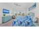 Bedroom with king bed, water views, and dresser at 395 Aruba Cir # 302, Bradenton, FL 34209