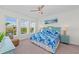 Main bedroom with water views and a king-size bed at 395 Aruba Cir # 302, Bradenton, FL 34209