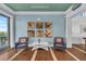 Relaxing clubhouse seating area with nautical-themed art at 395 Aruba Cir # 302, Bradenton, FL 34209