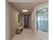 Condo entryway with bench, window, and door at 395 Aruba Cir # 302, Bradenton, FL 34209