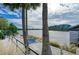 Serene waterfront view with a relaxing hammock at 395 Aruba Cir # 302, Bradenton, FL 34209
