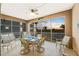 Peaceful lanai with outdoor seating and scenic sunset views at 395 Aruba Cir # 302, Bradenton, FL 34209