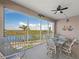 Lanai with seating area and lake view at 395 Aruba Cir # 302, Bradenton, FL 34209