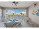 Relaxing lanai overlooking the lake at 395 Aruba Cir # 302, Bradenton, FL 34209