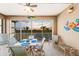 Spacious lanai with water views and outdoor furniture at 395 Aruba Cir # 302, Bradenton, FL 34209