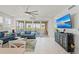 Bright living room with water views and comfortable seating at 395 Aruba Cir # 302, Bradenton, FL 34209
