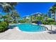 Refreshing community pool area with comfortable seating at 395 Aruba Cir # 302, Bradenton, FL 34209