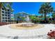 Serene water fountain in a landscaped courtyard at 395 Aruba Cir # 302, Bradenton, FL 34209