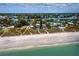 Beachfront community and coastline aerial view at 409 Casey Key Rd, Nokomis, FL 34275