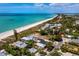 Beachfront home and community aerial view at 409 Casey Key Rd, Nokomis, FL 34275