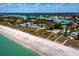 Beachfront homes and coastline aerial view at 409 Casey Key Rd, Nokomis, FL 34275