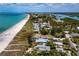 Beachfront home and neighborhood aerial view at 409 Casey Key Rd, Nokomis, FL 34275