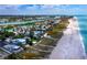 Beachfront home and neighborhood aerial view at 409 Casey Key Rd, Nokomis, FL 34275