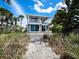 Beach access from the backyard at 409 Casey Key Rd, Nokomis, FL 34275
