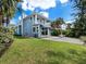 Spacious backyard with patio and ocean views at 409 Casey Key Rd, Nokomis, FL 34275