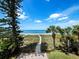 Private beach access path through lush vegetation at 409 Casey Key Rd, Nokomis, FL 34275