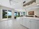 Kitchen with ocean views and breakfast bar at 409 Casey Key Rd, Nokomis, FL 34275