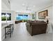 Spacious living area with ocean views and comfortable seating at 409 Casey Key Rd, Nokomis, FL 34275