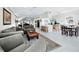 Open concept living area and kitchen with island at 409 Casey Key Rd, Nokomis, FL 34275