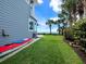 Kayak storage and grassy side yard at 409 Casey Key Rd, Nokomis, FL 34275
