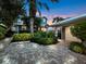 Landscaped walkway to the side entrance at 409 Casey Key Rd, Nokomis, FL 34275