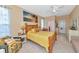 King-size bed, neutral decor, and a large window overlooking the water at 4111 Hemingway Dr, Venice, FL 34293