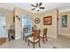 Bright dining room featuring glass top table and wicker chairs at 4111 Hemingway Dr, Venice, FL 34293